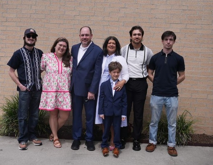 Steve and Stacy Massi with their family in Katy